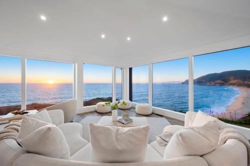 Distinguished Oceanfront Point Estate with Iconic Beach Mountain Vistas