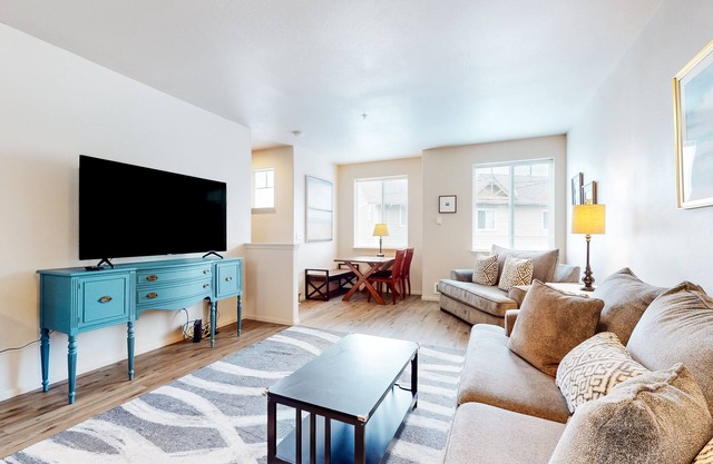 Dog-friendly condo with river views, private W/D, full kitchen, & great location