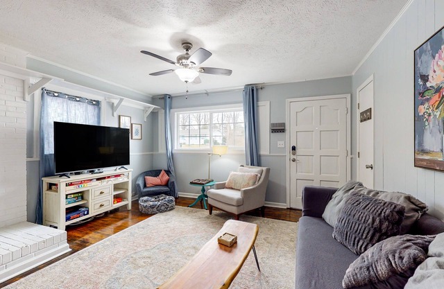 Dog-friendly hideaway with patio, smart TVs, electric fireplace, games, & AC