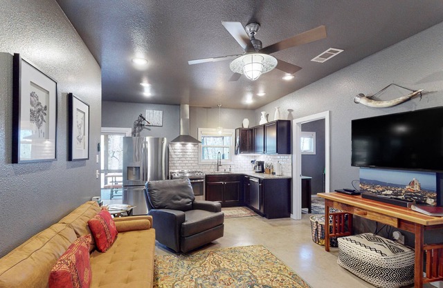 Dog-friendly home near the lake with a hot tub, firepit, grill & deck