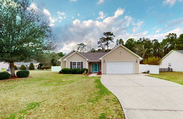 Dog-friendly home near downtown with fenced yard, patio, & fireplace