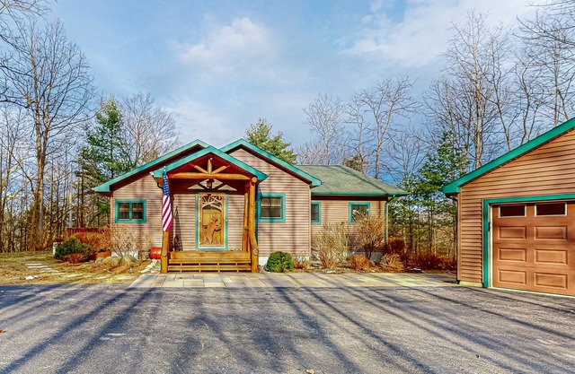 Dog-friendly home near Lake George with deck, grill, media room, fireplace, W/D