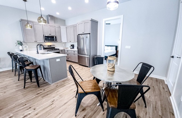 Dog-friendly home with two full kitchens, balcony, AC, washers & dryers
