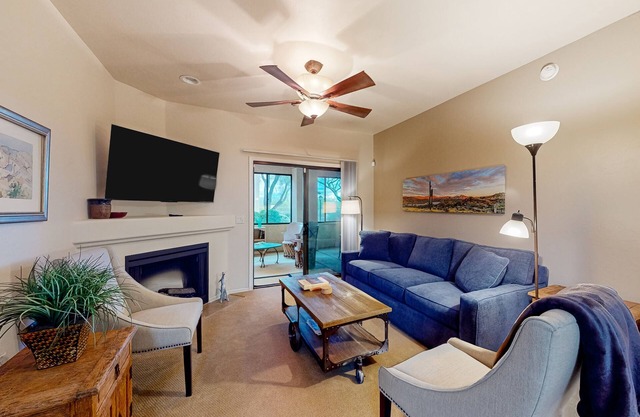 Dog-friendly mountain view condo with pool, gym, grill, fireplace, & sunroom