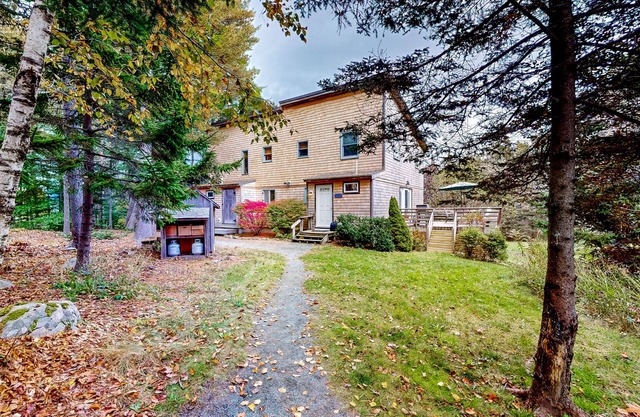 Dog-friendly ocean-view home with grill, wood stove, deck, washer/dryer, & AC