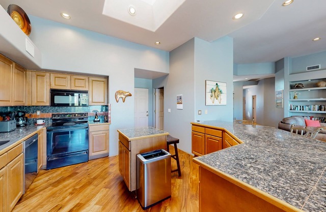 Dog-friendly retreat with lovely outdoor living space, central AC, & home office