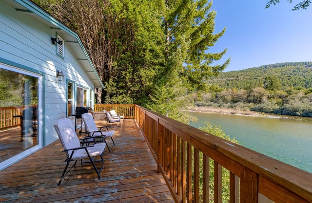 Dog-friendly, riverfront home with deck, fireplace, kayaks & water access