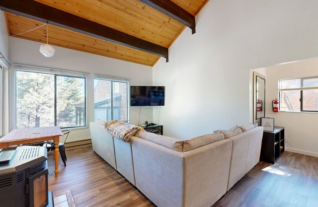 Dog-friendly snowbird escape with pool, hot tub & sauna access, & woodstove