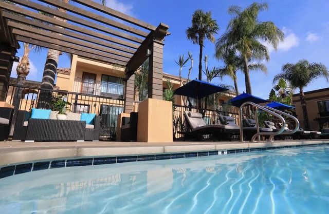 Double Queen Room, The Cove Hotel, Poolside Luxury and Outdoor Fireplace