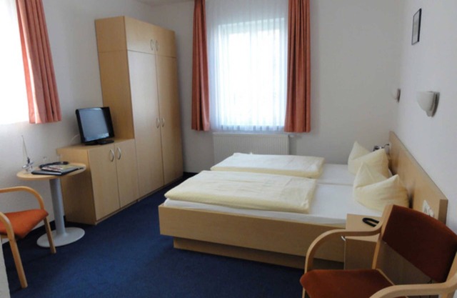 DZ 01. Standard mit Stadtblick - Hotel Garni Meeresgruß