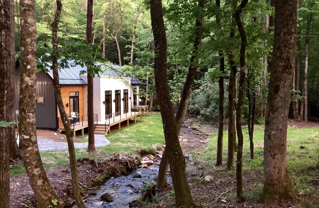 E Ranch is a modern, creek side, Scandinavian barnhouse.