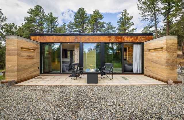 Earth-Built Cabin with Pine Shadows and a Tub That Waits