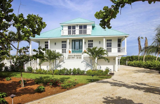 Elegant 4-Bedroom Beachfront Estate with Private Pool & Spa