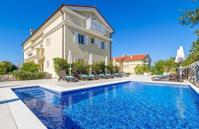 Elegant apartment Mande 1 with a terrace in villa on Krk