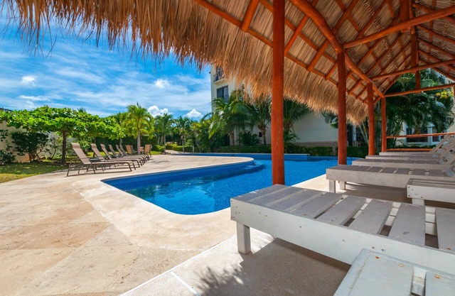 Elegant Oceanview Condo with Spacious Open-Concept Floor Plan and Inviting Beach Design