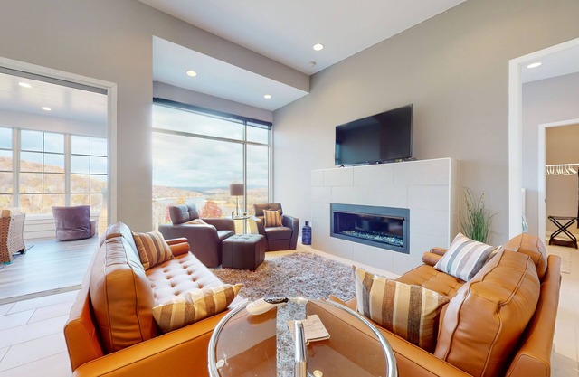 Elevated lake-view escape w/free attraction tickets, movie room, & sun room
