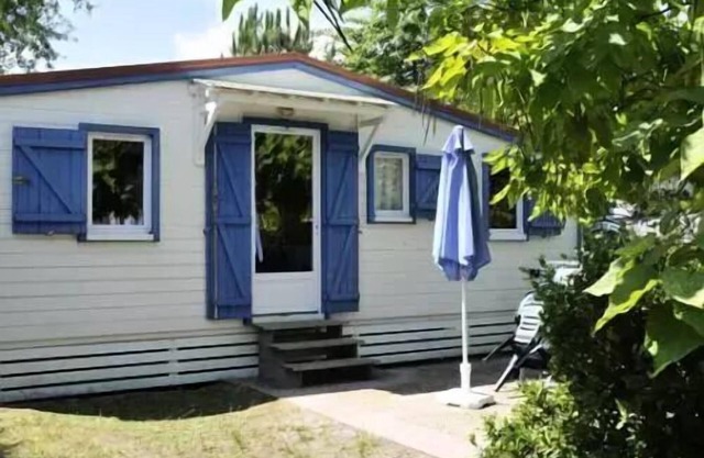 En Chon Les Pins - Camping-Caravaning * - Chalet wood 30m2 2 bedrooms n° 29 SATURDAY/SATURDAY 4 to 5 people - 4 pers. included in the tariff