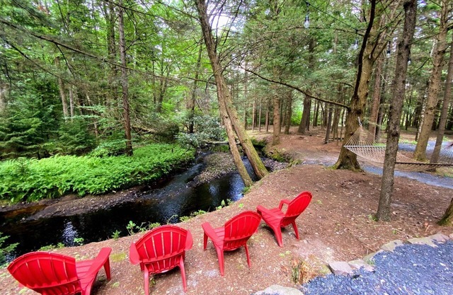 ENJOY POCONOS BY THE MONTH AT A TIME! COTTAGE AWAY FROM IT ALL ON STREAM!
