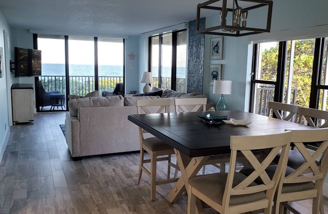 Escape to your HAPPY place, luxury corner condo right on the beach!