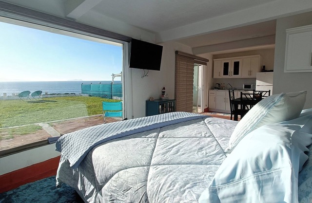 Estudio privado con fogata y vista al mar