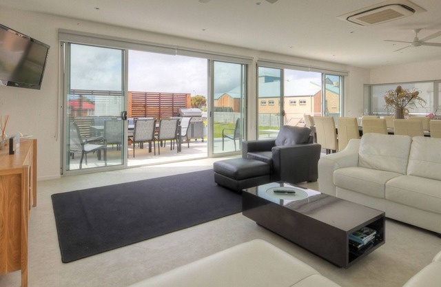 Excellent value for multiple families. Right behind the Surf Club.