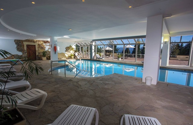 Experience Serenity – Spacious Room in Bariloche’s Natural Haven w/Heated Pool