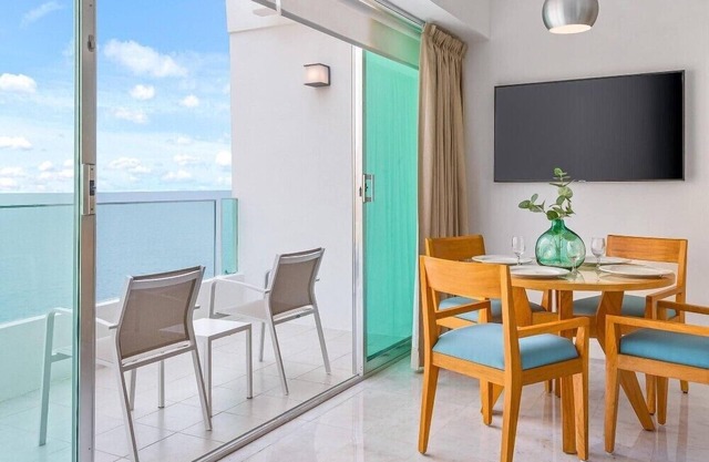 Exquisite 1 BR Condo with a Terrace and Private Beach Area