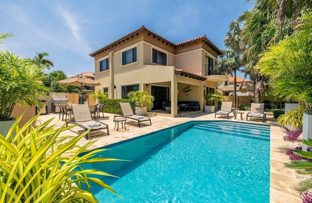 Exquisite Poolside Living with 3BR & 2BA at Diamante 165 by Bocobay