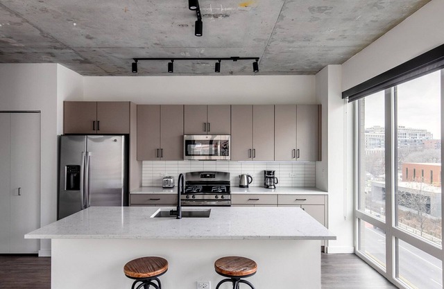 Exquisite River North 1BR w/Terrace, Fire Pits & Grills, by Blueground