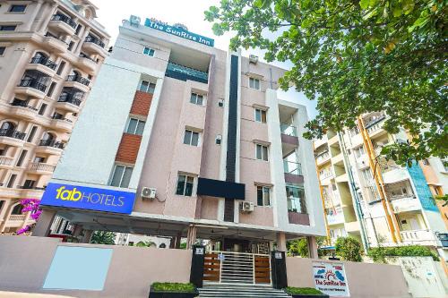 FabExpress The Sunrise Inn - Nr Gayatri Vidya Parishad College of Engineering