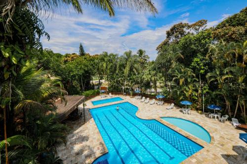 Fabuloso flat 243 Amarílis 2 piscinas climatizadas, carregador veiculo elétrico Riviera de São Lourenço, Bertioga Apartamento Duplex inteiro, cozinha equipada completa, serviço de praia, limpeza e trocas diária de toalhas, wi-fi 500mb
