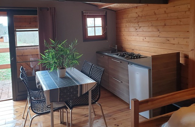 Family chalet in a small nature campsite