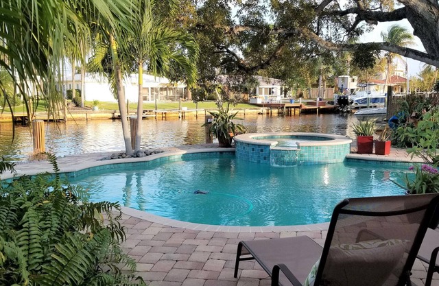 Family Waterfront Retreat – Private Pool, Hot Tub, Walk to Beach!