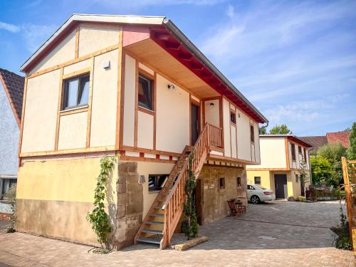 Ferienwohnung 'Ginkgo' mit verwunschenem Garten & privater Sauna