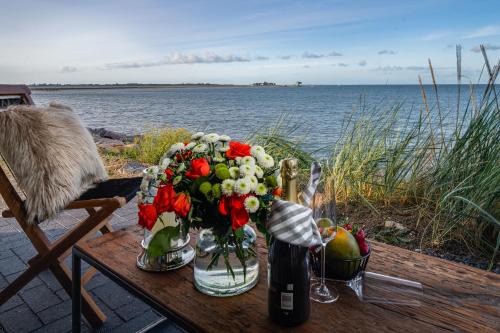 Ferienwohnung Nordglanz – Modernes Beachhouse-Flair im Herzen des OstseeResort Olpenitz