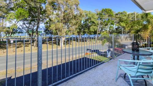 First floor unit close to shops, park and waterfront!