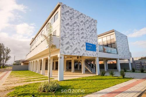 Flats completos e modernos em Jaguaruna a 50m da Praia - PLO