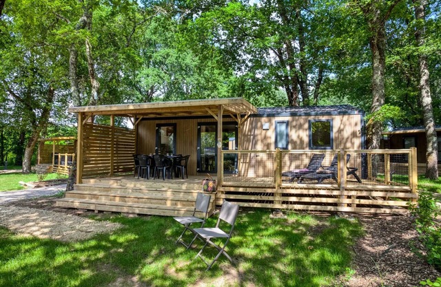 Flower Camping LES BERGES DE LA DORDOGNE * - Mobil-Home Premium 33m2 Bahia - 3 bedrooms + semi-covered terrace +LV + TV + CLIM 6 people