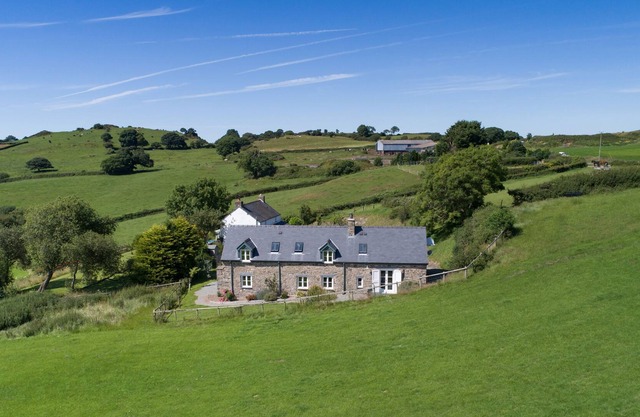 Four bedrooms, three en-suite shower rooms. Sleeps 7. Ample parking.