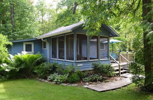 Get away at this quaint cottage tucked behind a beautiful fern bed.
