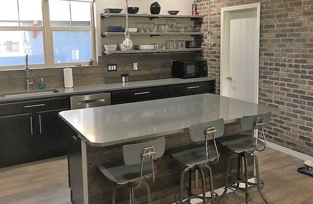 Gorgeous, contemporary, open floor plan for your family & pup!