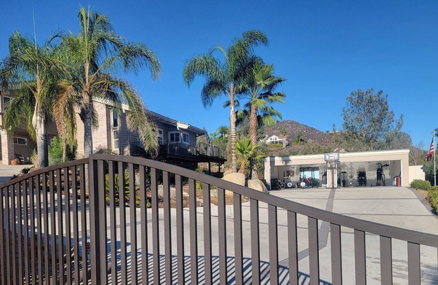 Gorgeous private gated estate in Rancho San Diego +4 car gym!