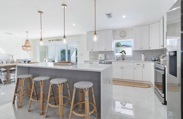 Gorgeous Waterfront Luxe Home w/Heated Pool. Perfect Location!