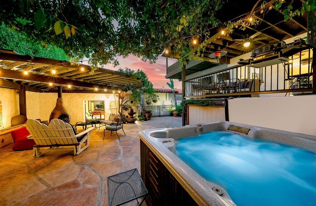 Grand Spanish Style 5BD w/Huge 360 Rooftop Deck w/Airport Views, AC, & Hot Tub!