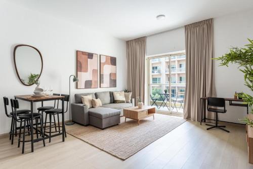 GuestReady - Furnished 1BR+Sofa | Al Alka Greens