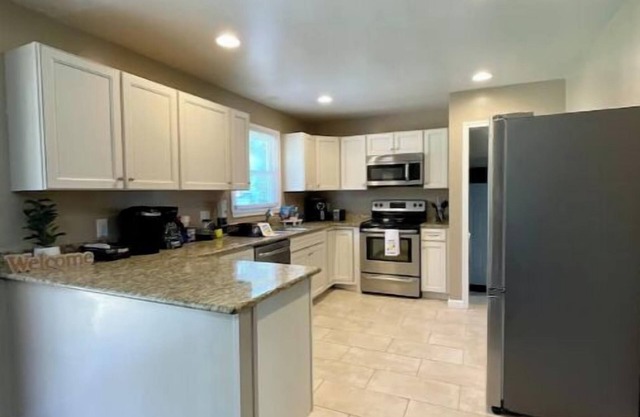 Hidden Gem A Comfortable 4bedroom home with a fenced-in yard.