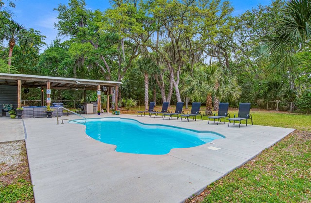 Hidden Oasis home with game room, saltwater pool and fire pit