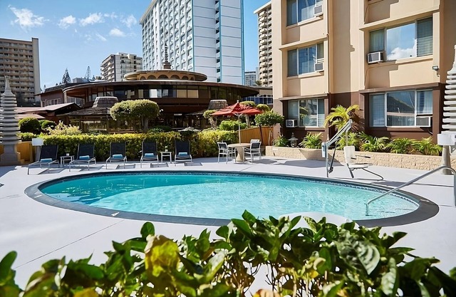 High Floor City View Two Queens, Elevated Pool Views, Peaceful Koi Gardens