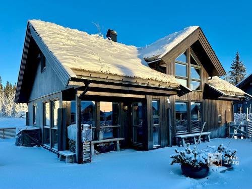 High standard cabin at Sjusjøen sauna, hot tub & ski trails right outside