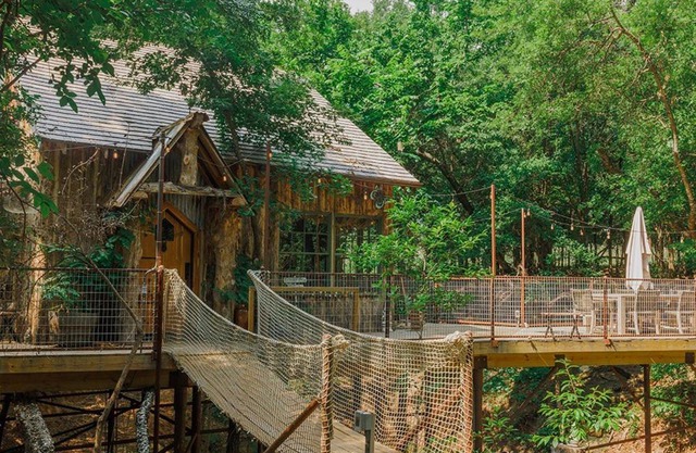 Hobbit Treehouse with waterfall on the Brazos River! 350 acres! Tubing! Petting zoo!